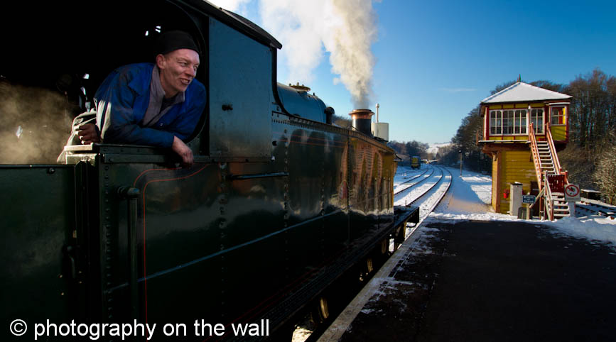 Steam Train 5643 and driver  in winter at Bolton Abbey Station, Yorkshire. 90cmx50cm